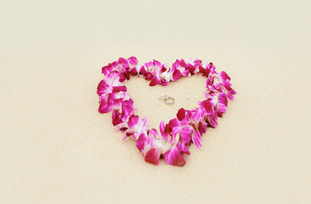 Orchid heart on the beach